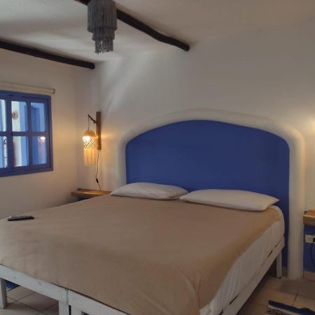 Mio Tulum Hotel Boutique Buitenkant foto A bedroom in a hotel in Tunisia