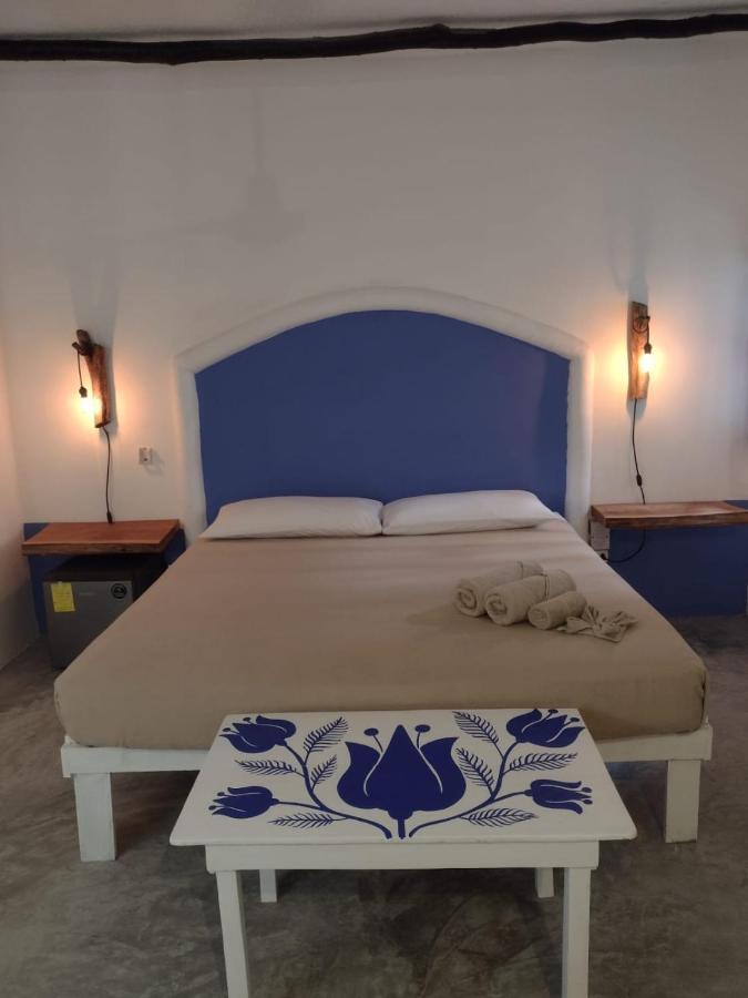 Mio Tulum Hotel Boutique Buitenkant foto A bedroom in a hotel