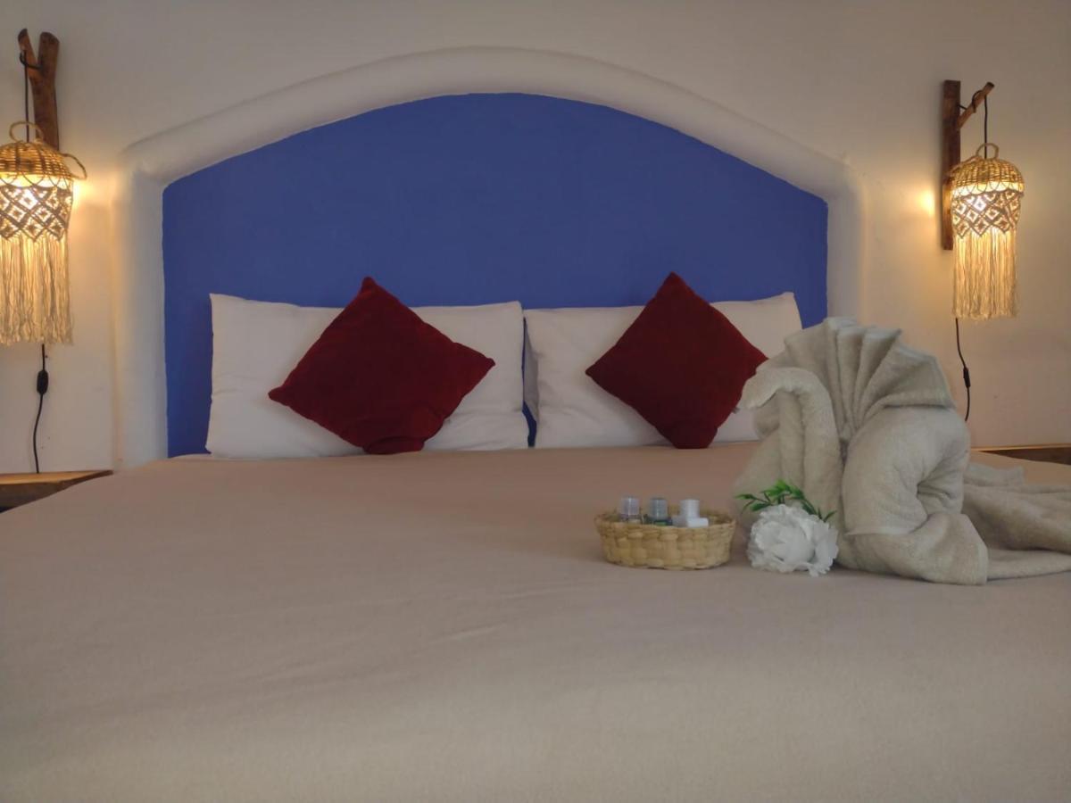 Mio Tulum Hotel Boutique Buitenkant foto A bedroom at the hotel
