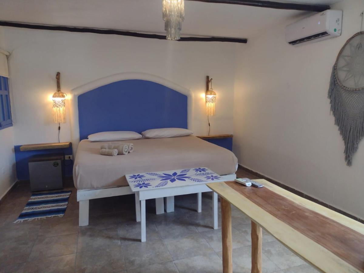 Mio Tulum Hotel Boutique Buitenkant foto A bedroom in the hotel