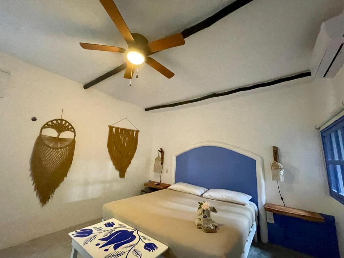Mio Tulum Hotel Boutique Buitenkant foto A bedroom at the hotel