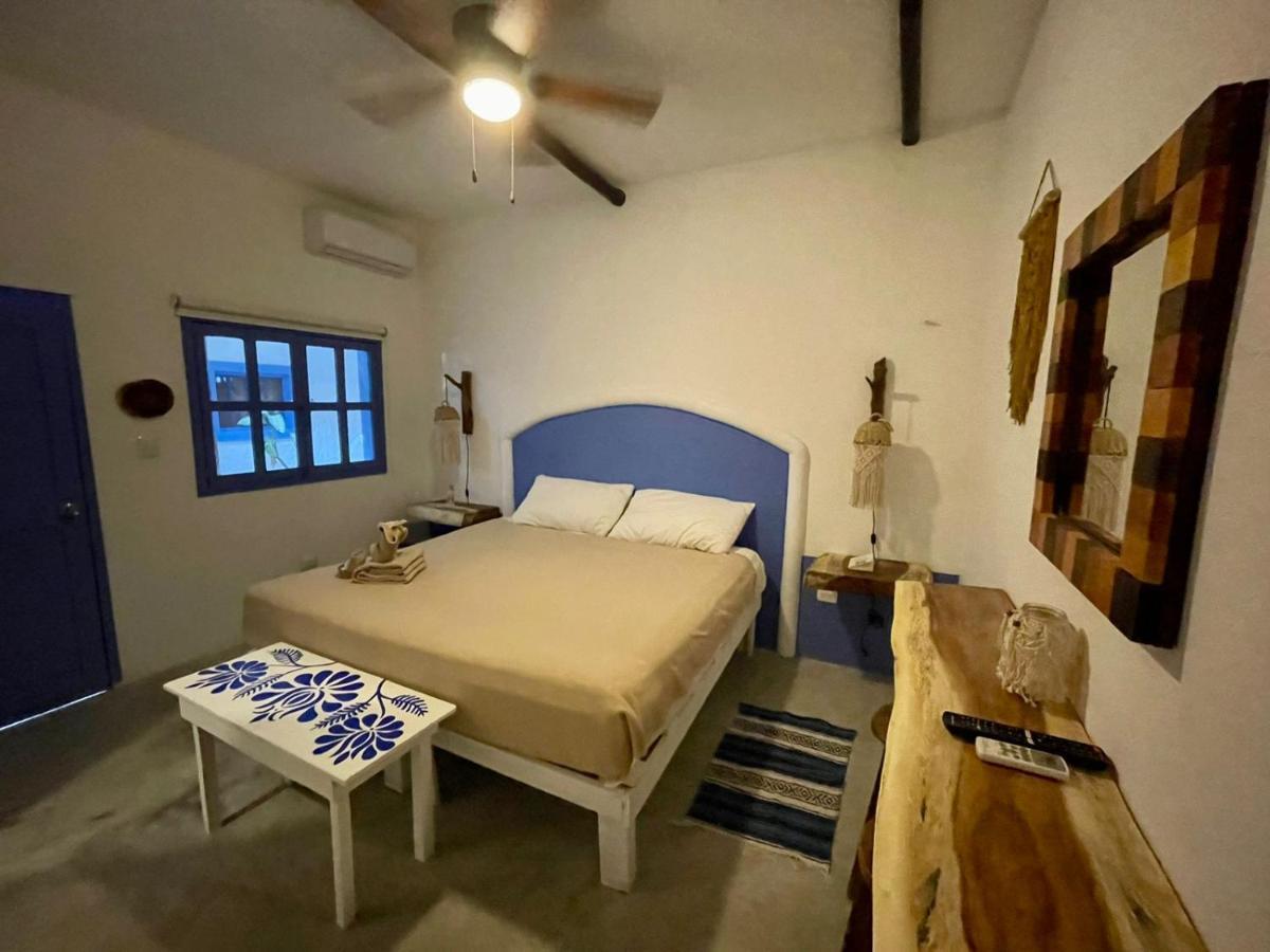 Mio Tulum Hotel Boutique Buitenkant foto A bedroom in a hotel in San Cristóbal de Las Casas, Chiapas, Mexico