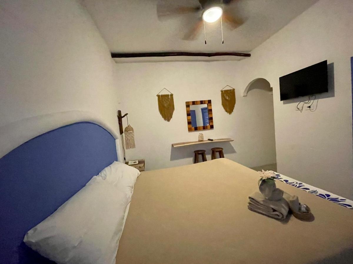 Mio Tulum Hotel Boutique Buitenkant foto A room at the hotel