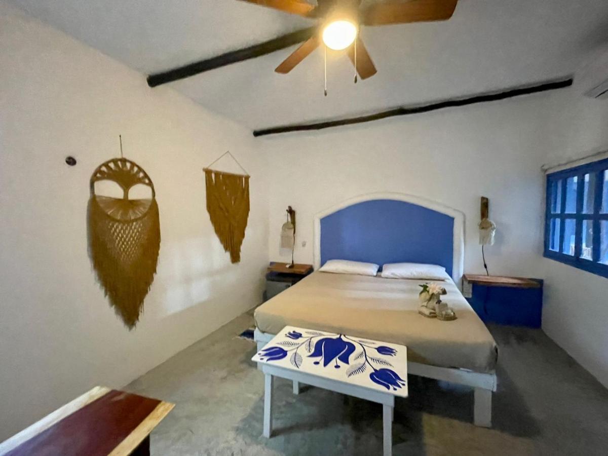 Mio Tulum Hotel Boutique Buitenkant foto A bedroom at the hotel