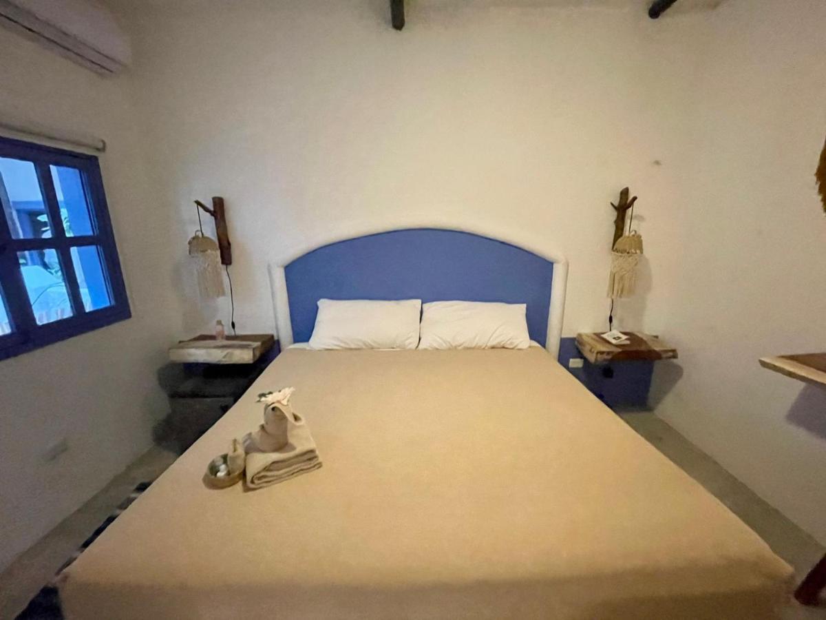 Mio Tulum Hotel Boutique Buitenkant foto A bedroom in the hotel