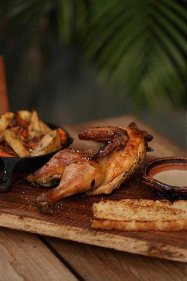 Mio Tulum Hotel Boutique Buitenkant foto A half chicken
