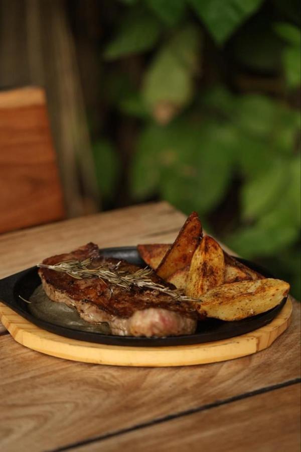 Mio Tulum Hotel Boutique Buitenkant foto A steak with potato