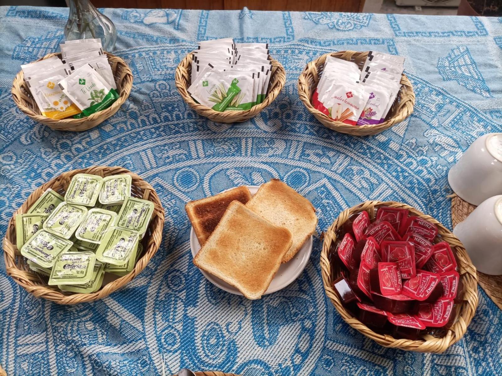 Mio Tulum Hotel Boutique Buitenkant foto A selection of jams and spreads